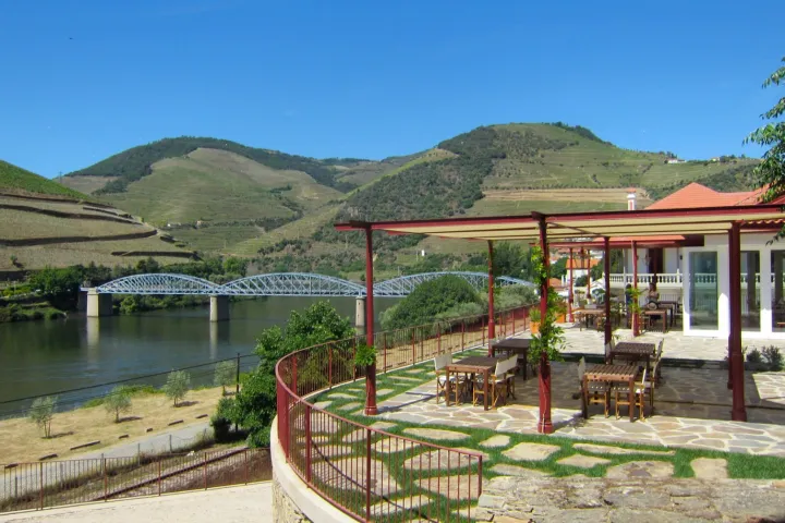 a building with a mountain in the background